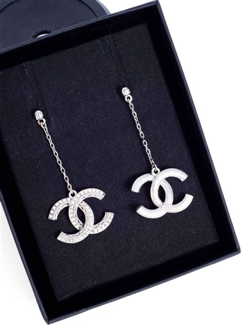 chanel swarovski crystal logo earrings.